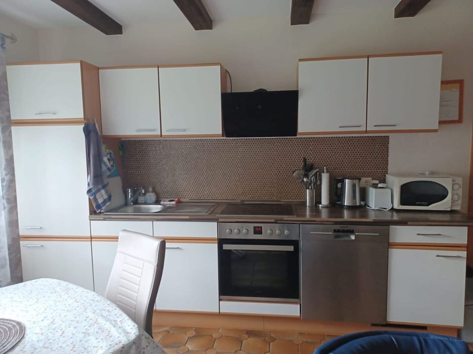 Apartment | Private kitchen | Electric kettle, toaster, highchair