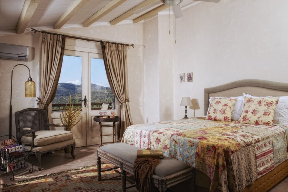 Deluxe Room, Garden View | Minibar, in-room safe, soundproofing, free WiFi