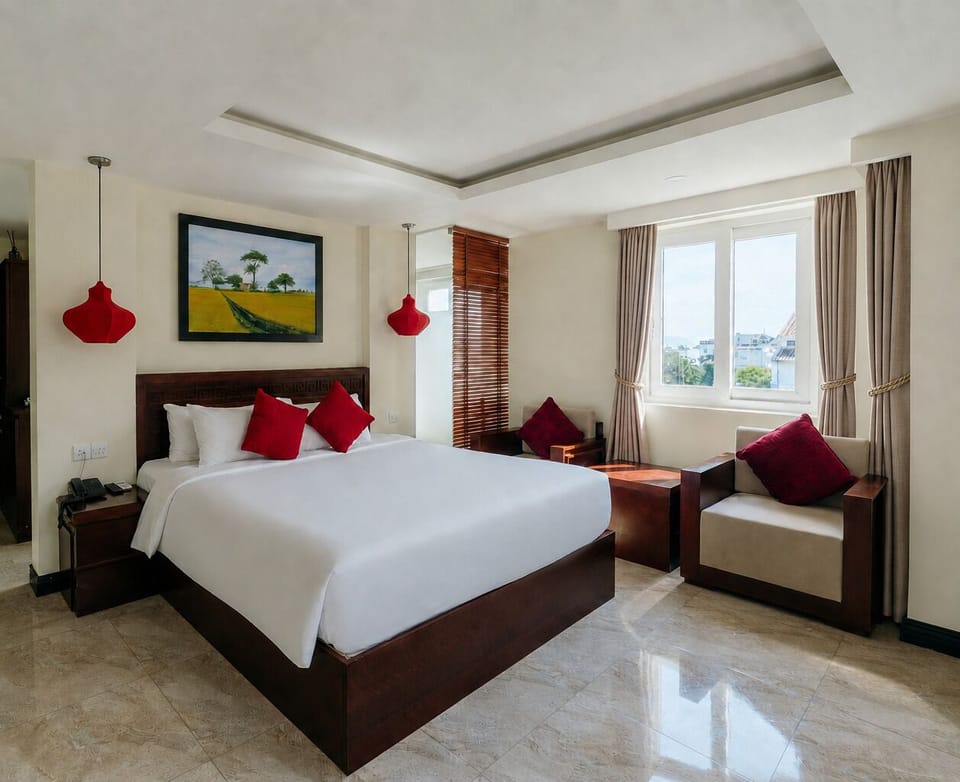 Junior Suite, City View | Minibar, in-room safe, desk, blackout drapes