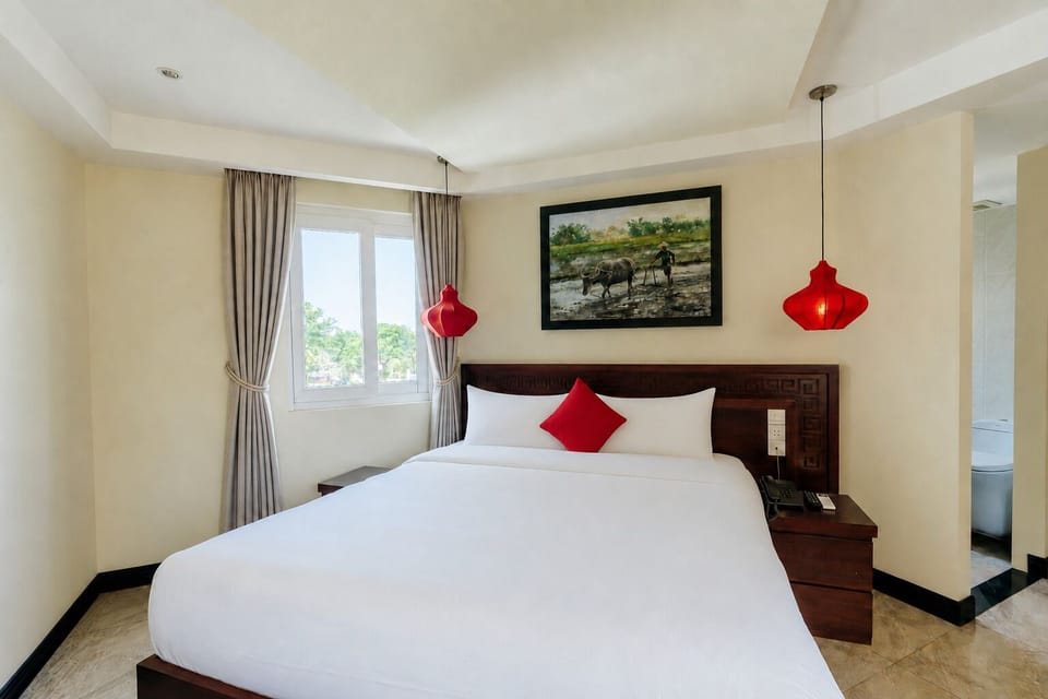 Deluxe Double or Twin Room, Pool View | Minibar, in-room safe, desk, blackout drapes