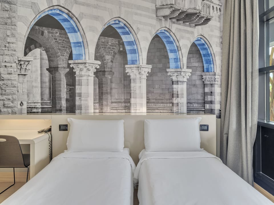 Twin Room, Non Smoking | In-room safe, desk, iron/ironing board, free WiFi