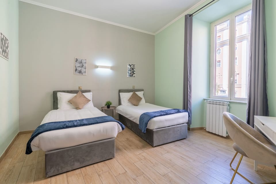 Twin Room | Down comforters, in-room safe, desk, soundproofing