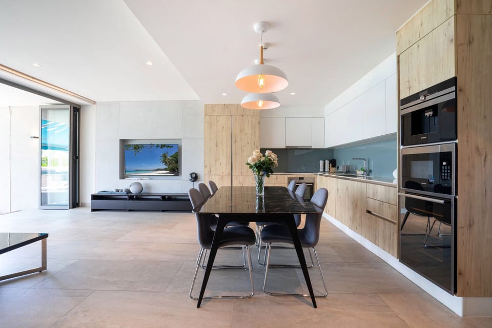 Exclusive Apartment, 3 Bedrooms, Patio, Sea View | Living area | Flat-screen TV