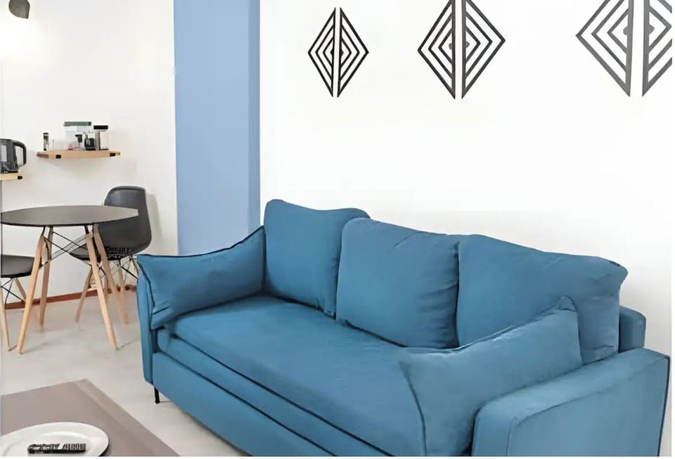 Apartment | Living area | 45-inch Smart TV with cable channels, streaming services