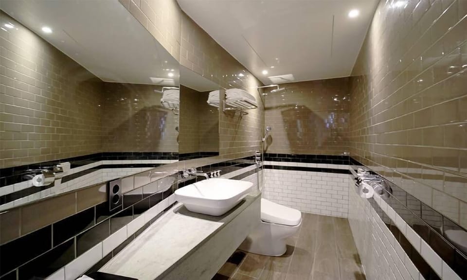 Suite Family Room (Check-in time 6PM / No Pool) | Bathroom | Free toiletries, hair dryer, bathrobes, slippers