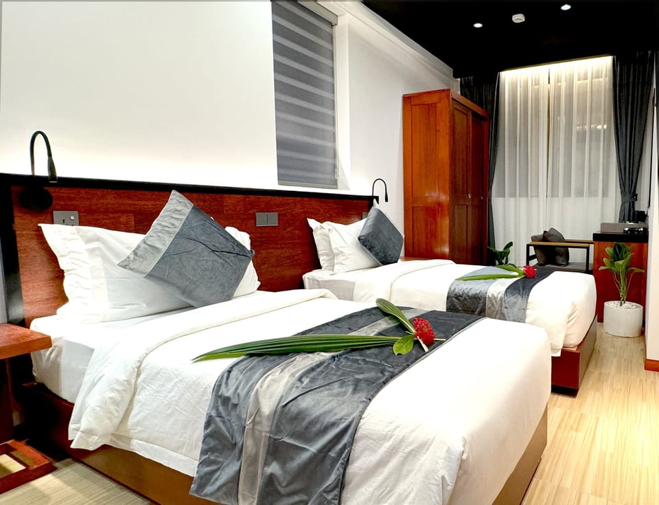Standard Double or Twin Room | In-room safe, desk, laptop workspace, iron/ironing board