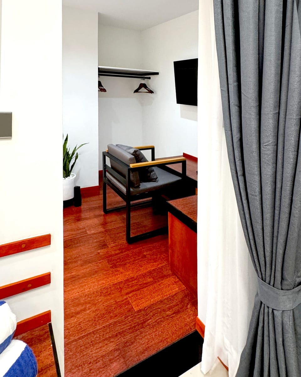 Family Room | In-room safe, desk, laptop workspace, iron/ironing board