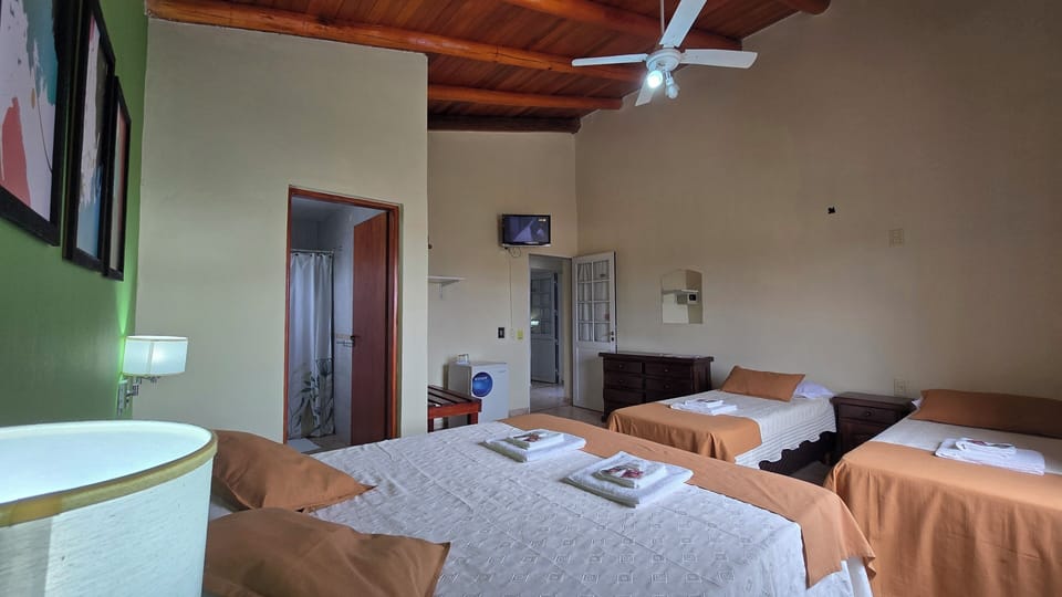 Family Quadruple Room | Minibar, in-room safe, individually furnished, free WiFi