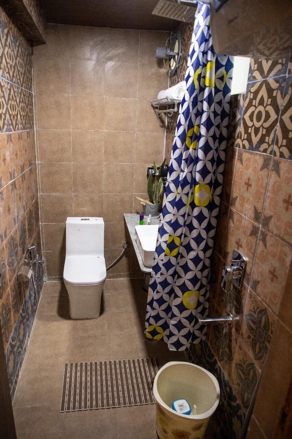 Shower, free toiletries, hair dryer, slippers