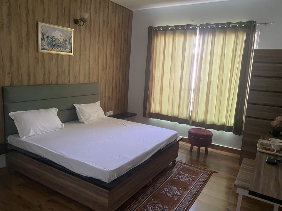 Premium bedding, down comforters, desk, laptop workspace