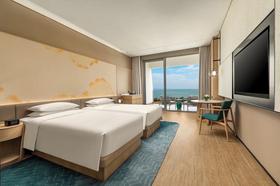 Premium bedding, down comforters, minibar, in-room safe