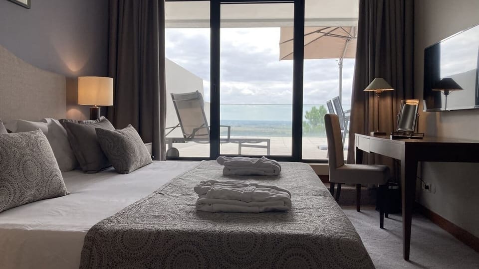 Superior Suite, 1 King Bed | Minibar, in-room safe, desk, laptop workspace