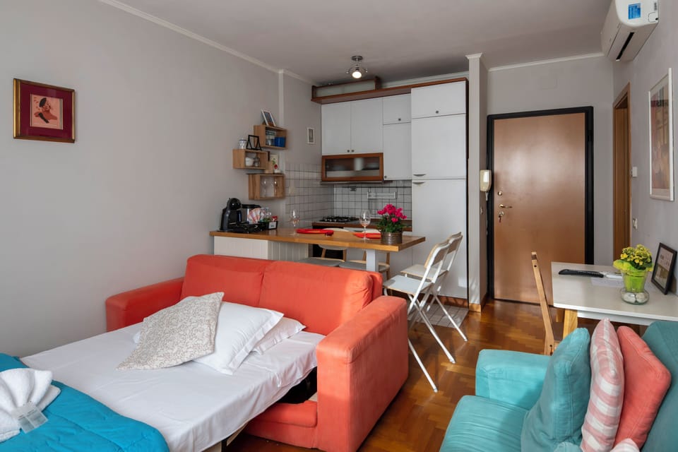 Apartment, 1 Bedroom | Living area | 24-inch flat-screen TV with digital channels