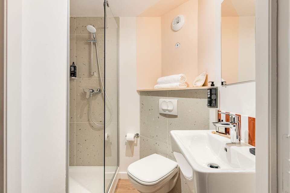 Shower, towels, soap, shampoo