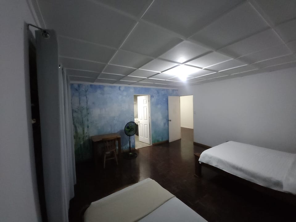 Basic Quadruple Room | Soundproofing, free WiFi, bed sheets