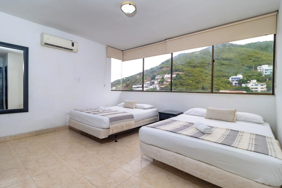 Desk, laptop workspace, WiFi (free), bed sheets