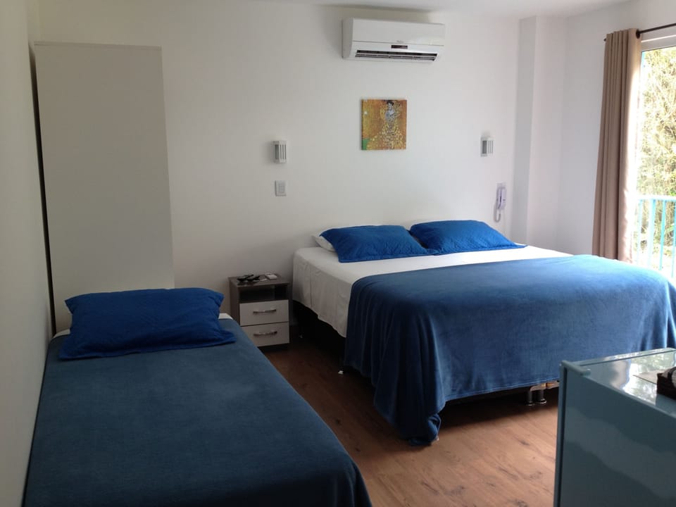 Comfort Quadruple Room, 1 Bedroom | Minibar, in-room safe, soundproofing, free WiFi