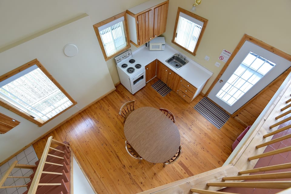 Chalet, 2 Double Beds (Mezzanine) | Living area | TV