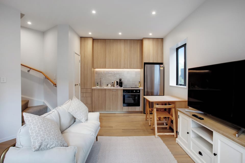 Townhome | Living area | 42-inch TV with digital channels