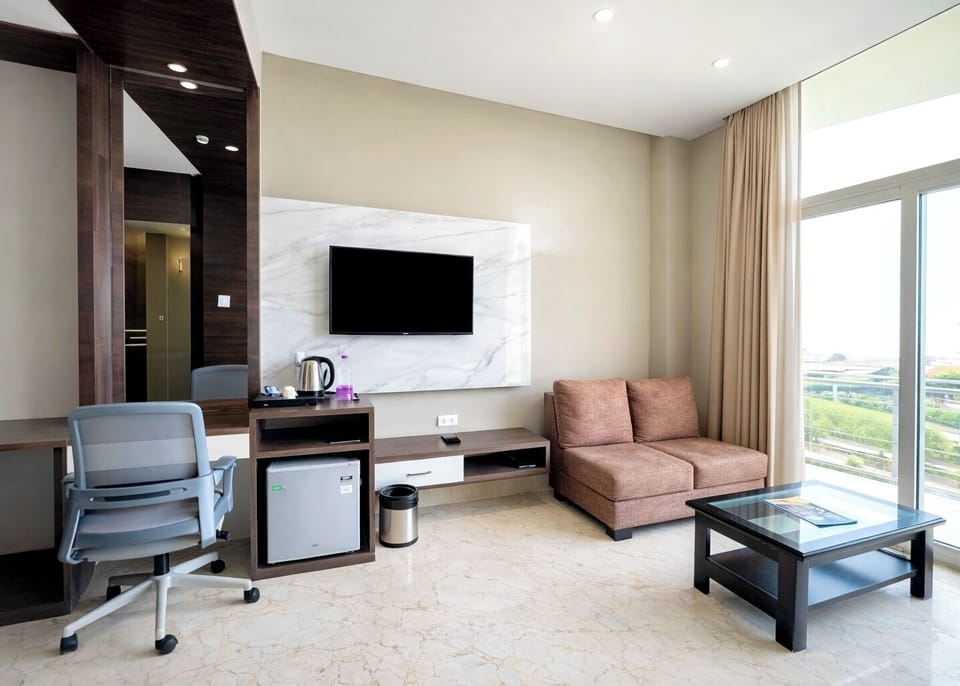 Premium bedding, desk, laptop workspace, soundproofing