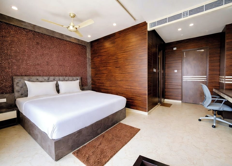 Premium bedding, desk, laptop workspace, soundproofing