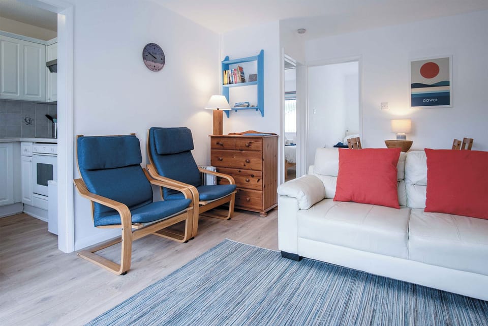 Standard Chalet | Living area | 32-inch flat-screen TV with cable channels