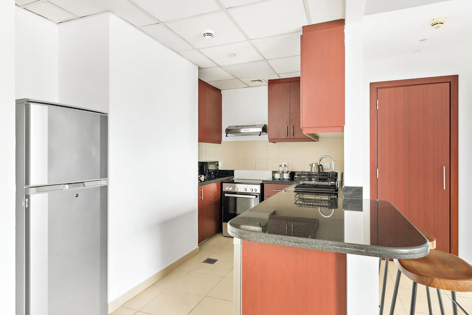 Comfort Apartment, 1 King Bed | Private kitchen | Full-size fridge, microwave, oven, stovetop