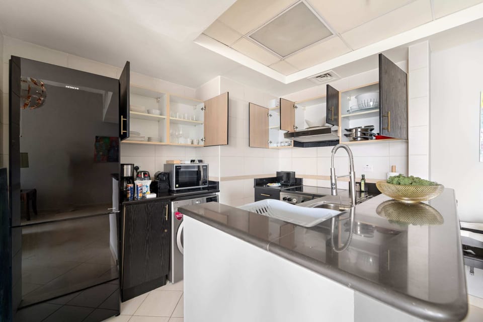 Classic Apartment | Private kitchen | Fridge, microwave, oven, stovetop