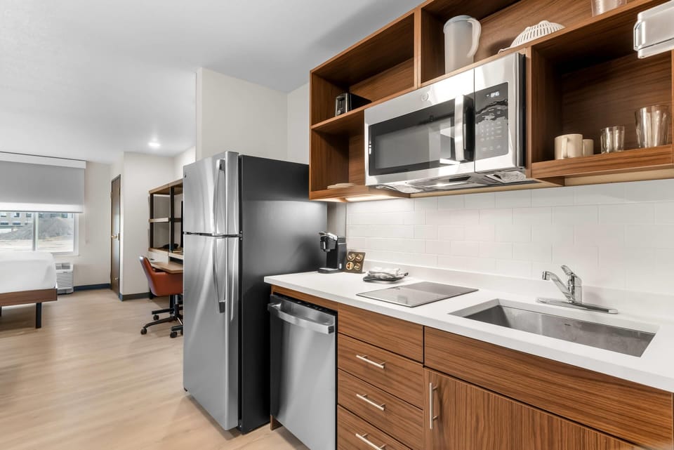 Suite, 1 King Bed, Non Smoking | Private kitchen | Coffee/tea maker