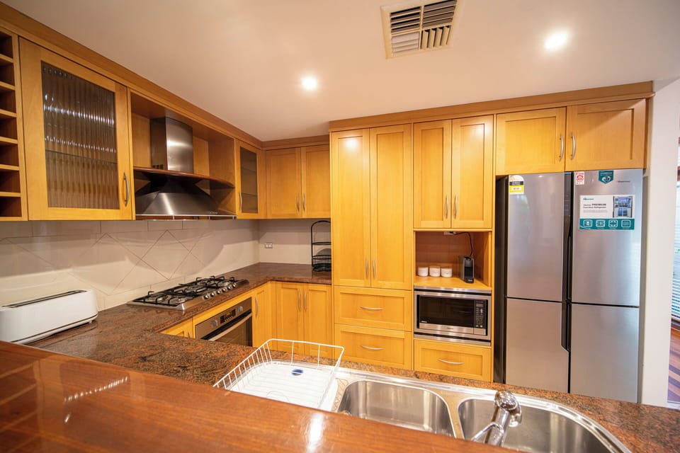 Economy Townhome, Balcony | Private kitchen | Electric kettle, toaster
