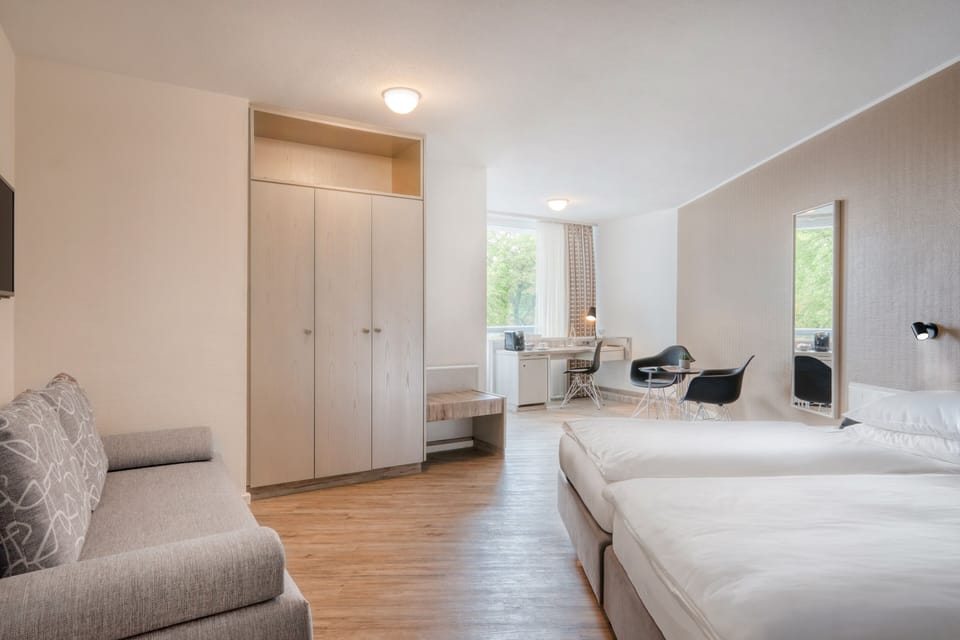 Privilege Room some with a sofa bed | In-room safe, desk, laptop workspace, blackout drapes