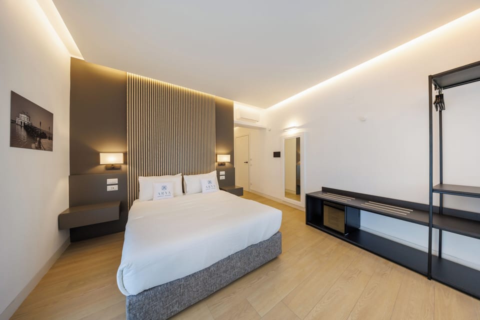 Deluxe Room, City View | In-room safe, desk, laptop workspace, blackout drapes