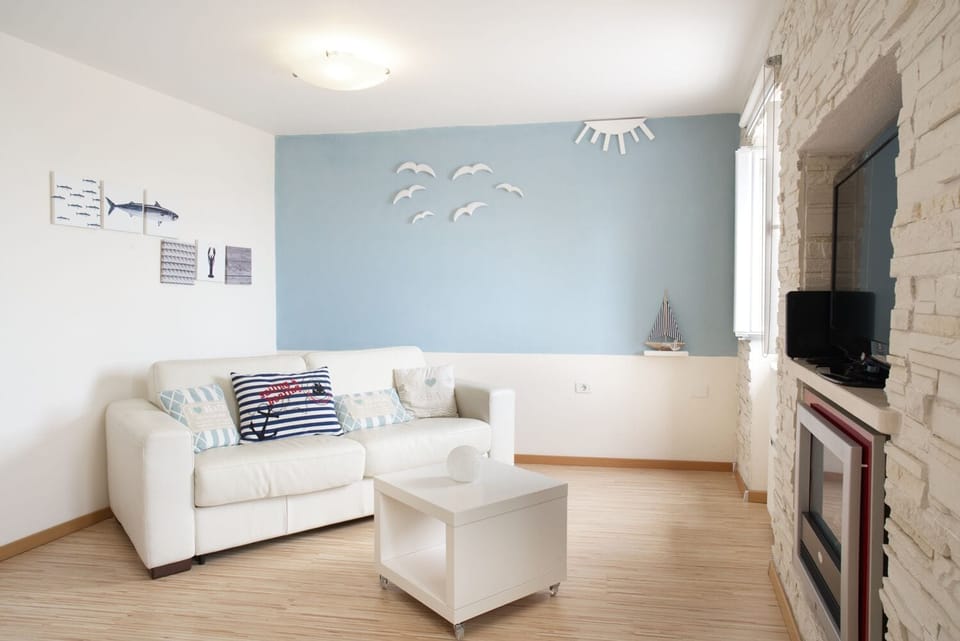 Comfort Apartment, 1 Bedroom, Sea View, Oceanfront | Living area | Flat-screen TV