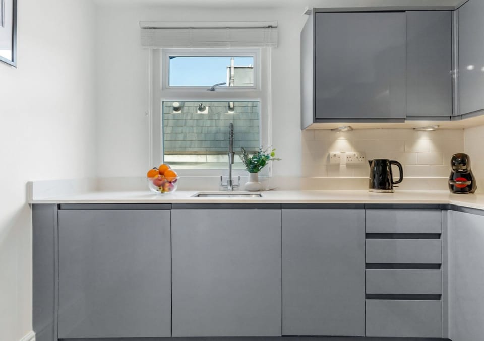 Family Duplex, Non Smoking, City View | Private kitchen | Toaster, highchair, cleaning supplies, freezer