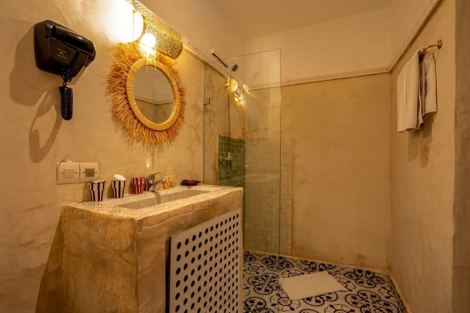 Shower, free toiletries, hair dryer, towels