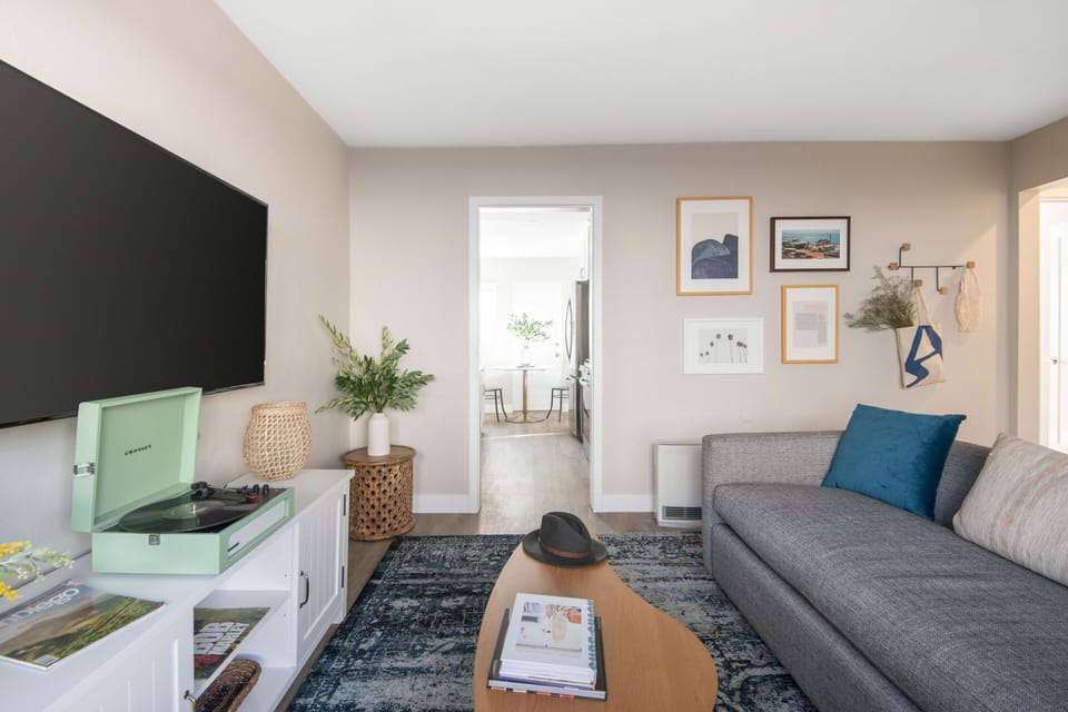 Apartment, 1 Bedroom | Living area | 55-inch Smart TV with digital channels