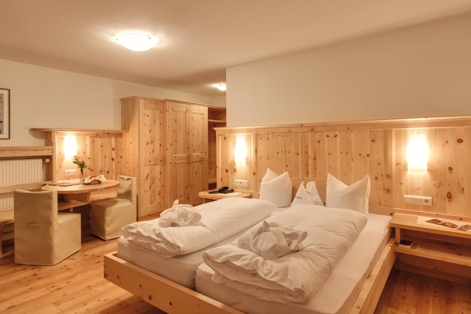Deluxe Triple Room, Balcony | Minibar, in-room safe, desk, laptop workspace