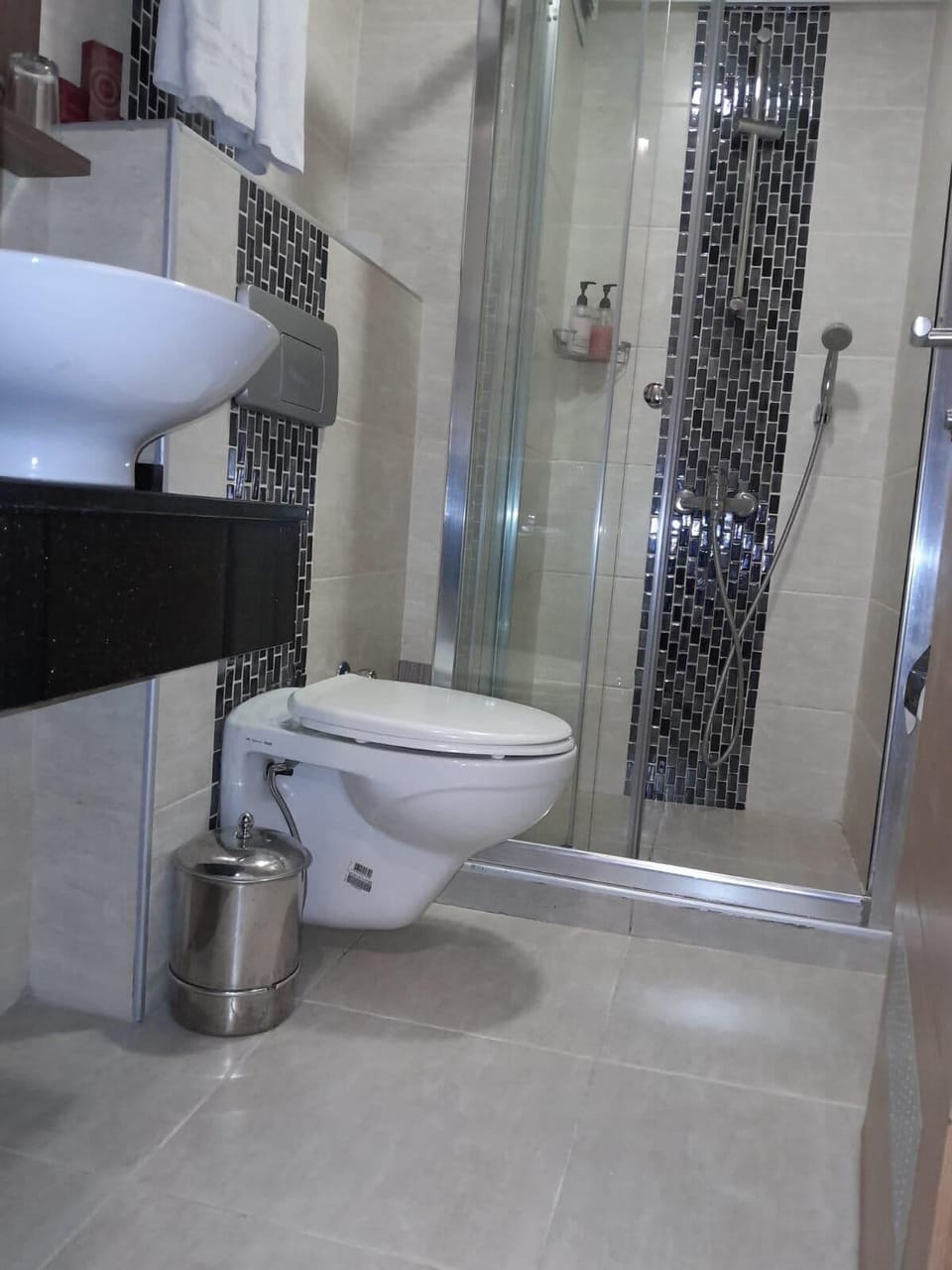 Shower, free toiletries, hair dryer, towels