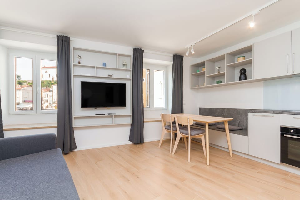 Superior Apartment, 1 Bedroom, City View | Living area | Flat-screen TV