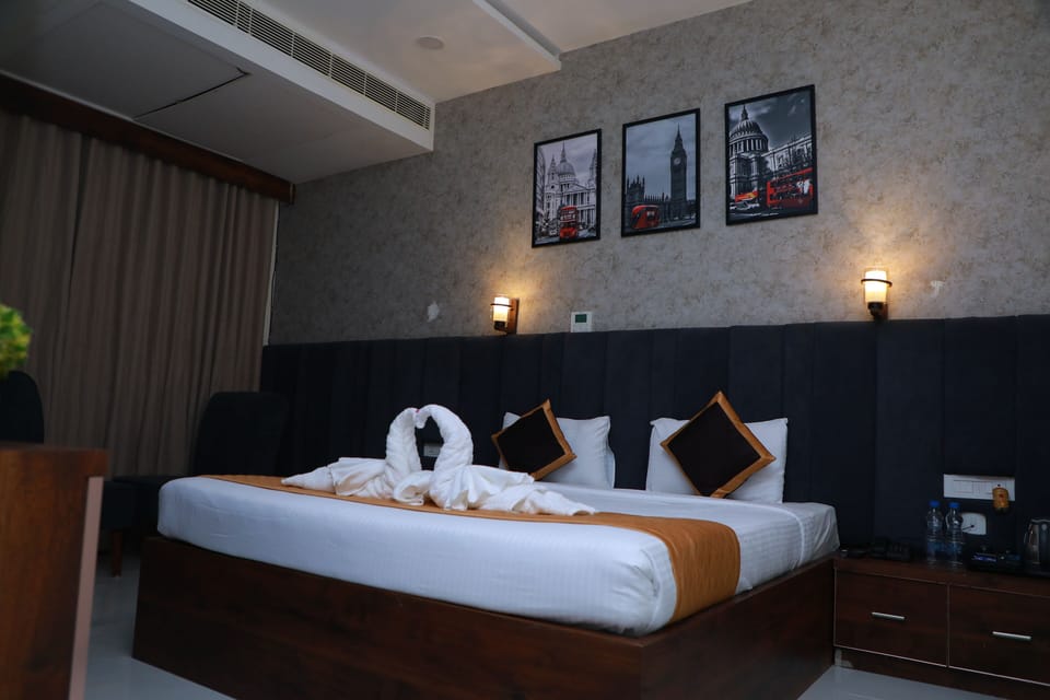 Junior Suite, Garden View | In-room safe, desk, laptop workspace, soundproofing