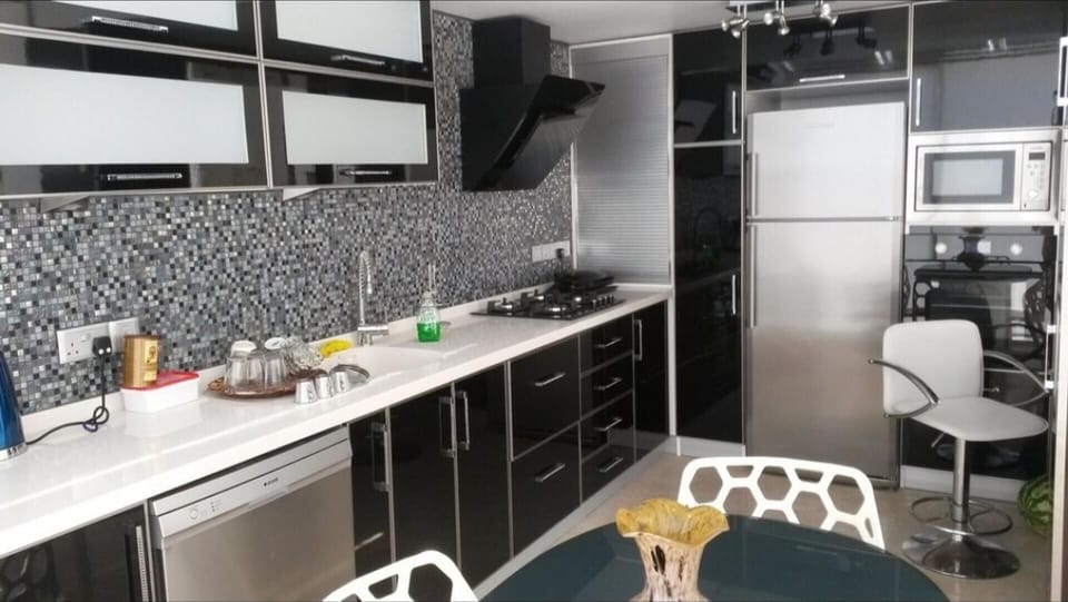 Villa | Private kitchen | Fridge, microwave, oven, stovetop
