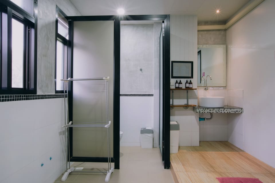 Shower, hair dryer (on request), soap, shampoo