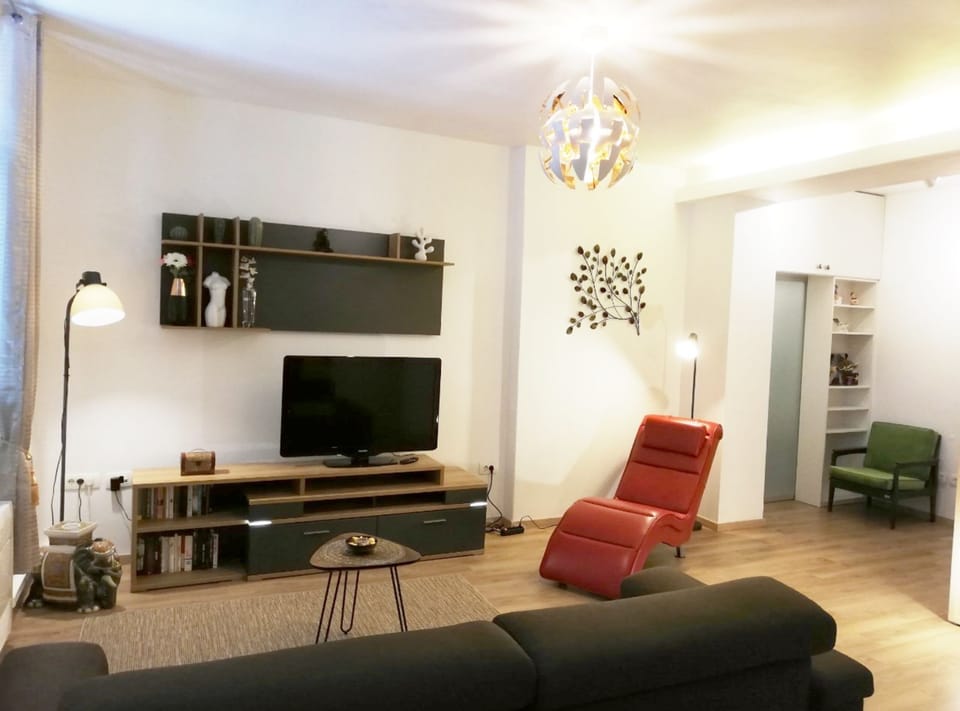 Apartment (One Bedroom Apartment) | Living room | 32-inch flat-screen TV with digital channels