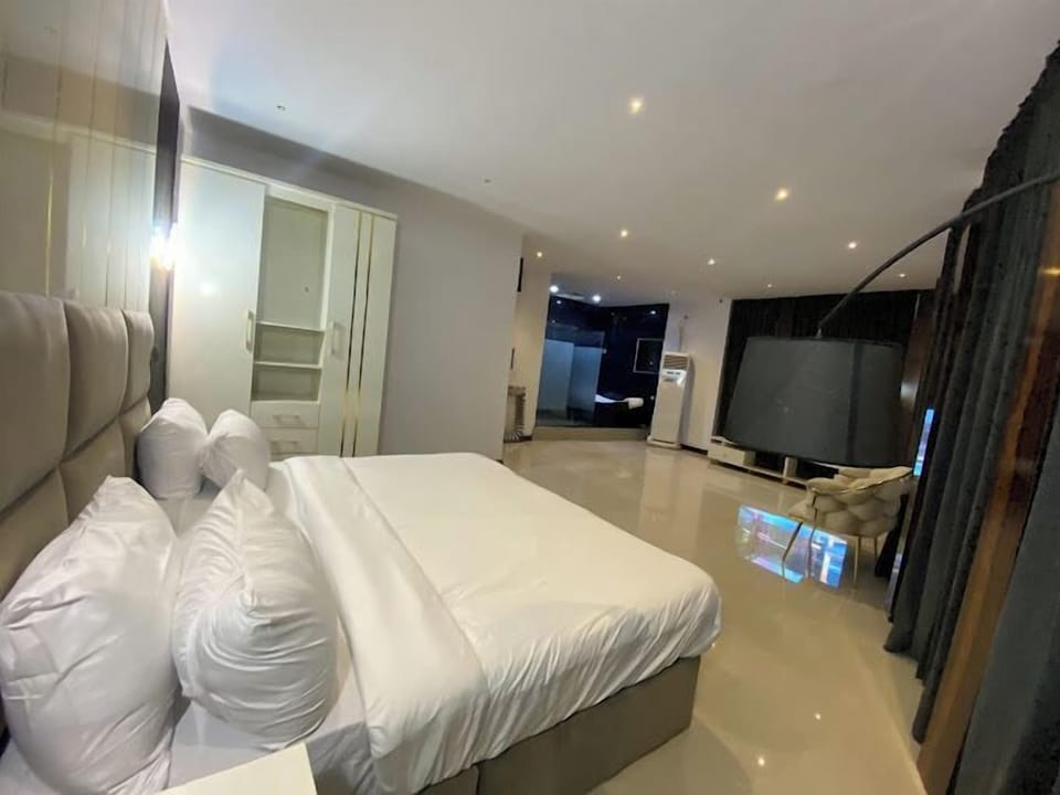Deluxe Room, Balcony, City View | Desk, laptop workspace, free WiFi