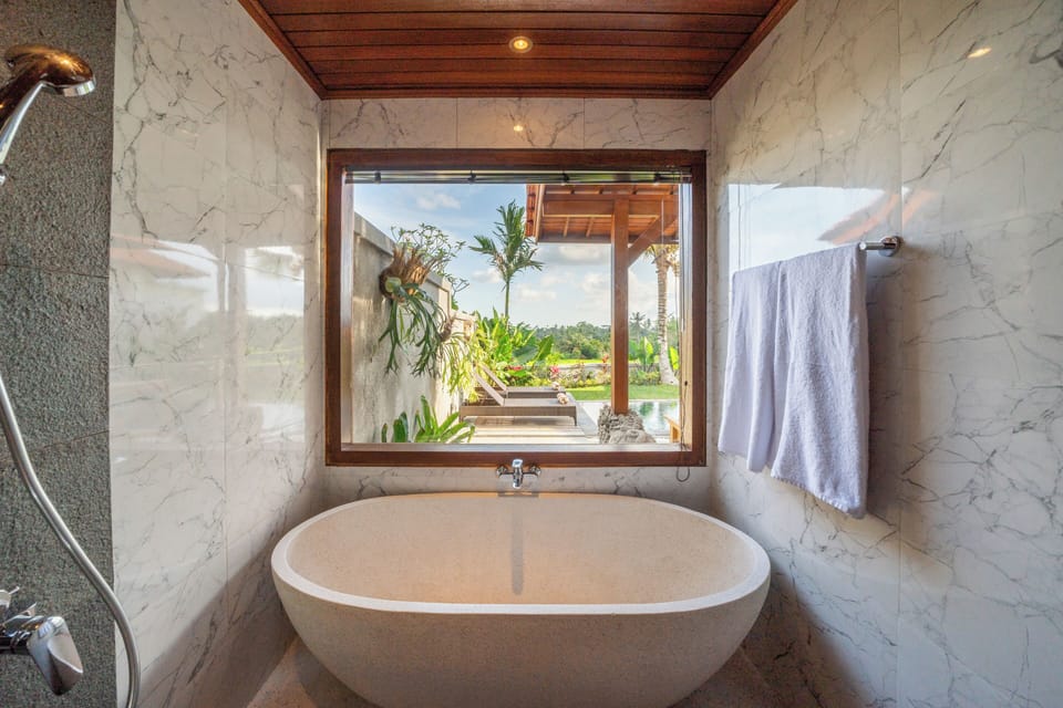Luxury Room, Private Pool, Resort View | Bathroom | Separate tub and shower, hair dryer, slippers, bidet
