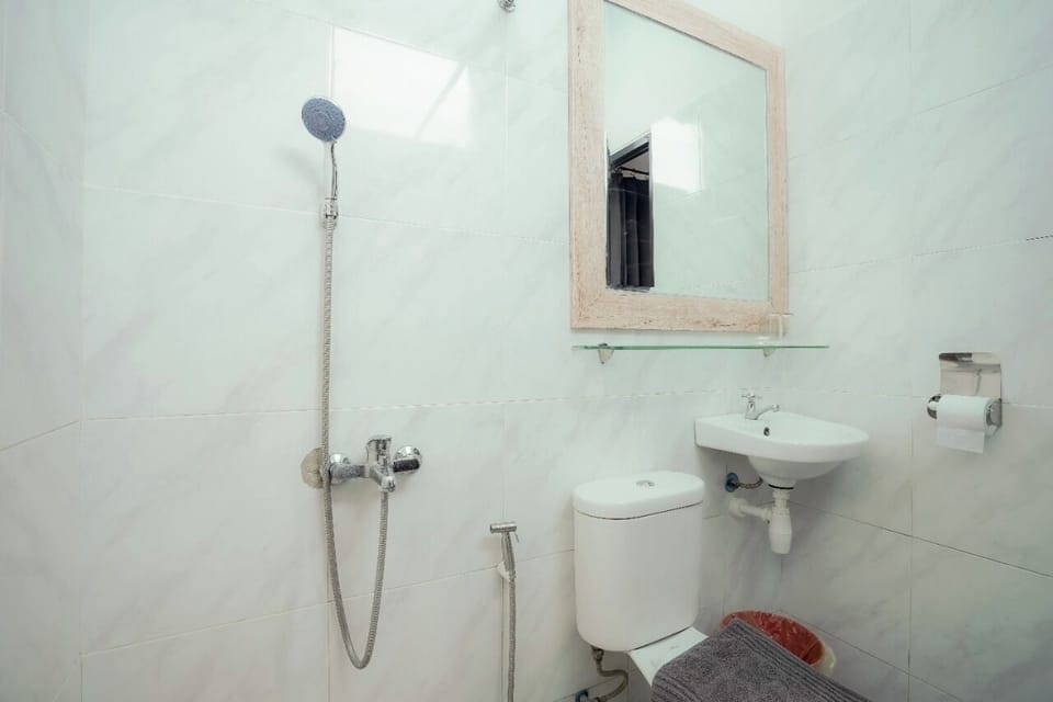 Shower, slippers, towels, soap