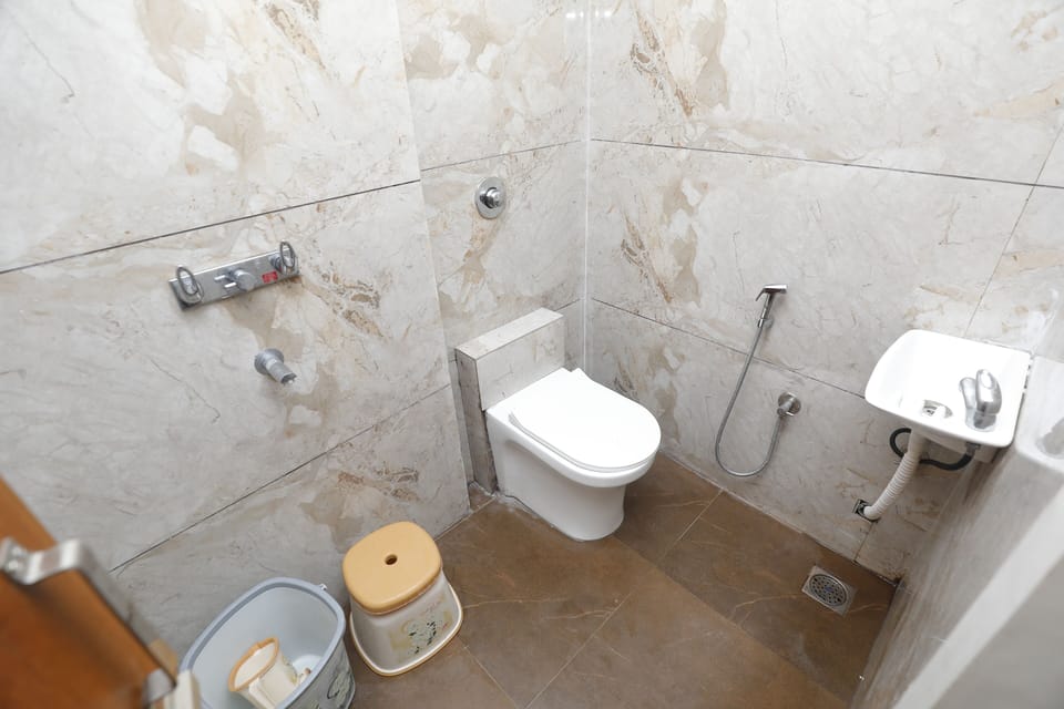 Standard Triple Room, City View | Bathroom | Shower, hair dryer (on request), slippers, towels