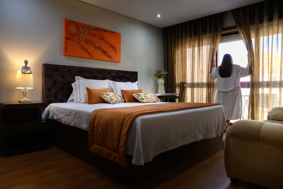 Premium Room | Down comforters, desk, laptop workspace, blackout drapes