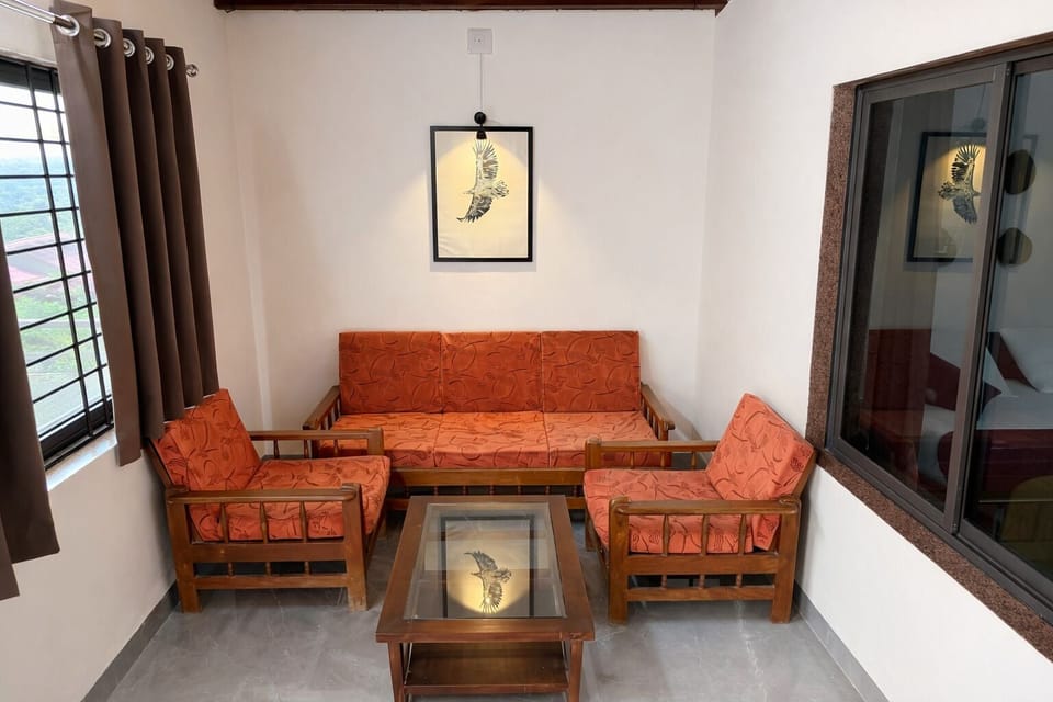 Junior Suite | Living area | 32-inch LCD TV with cable channels