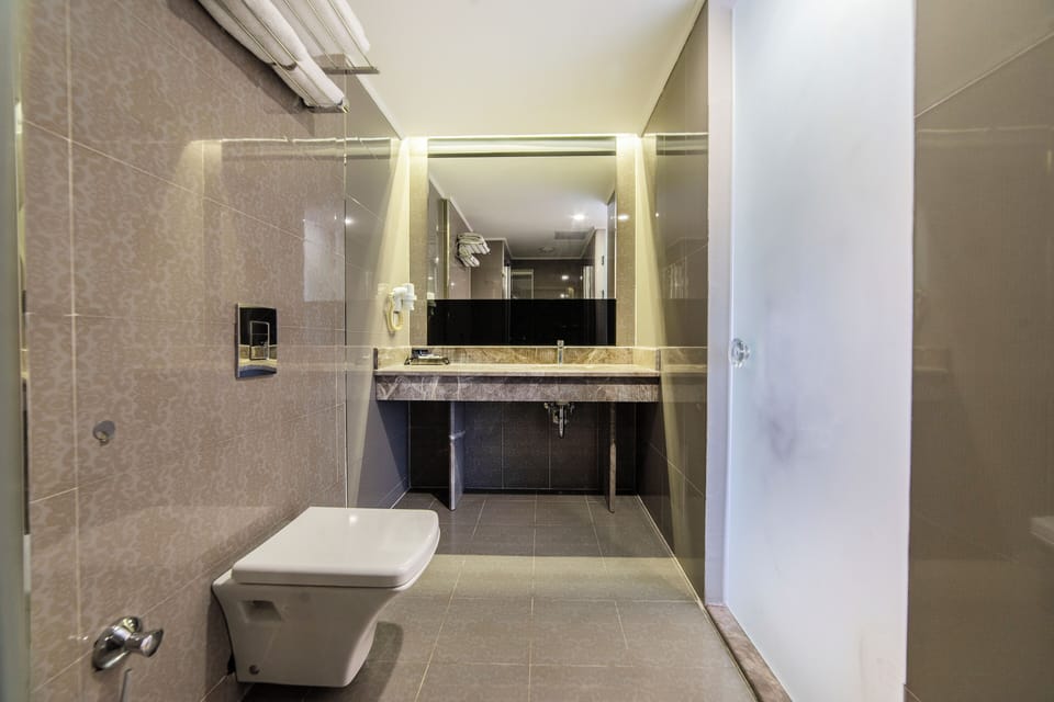 Family Room, Non Smoking, City View | Bathroom | Hair dryer, slippers, towels, soap